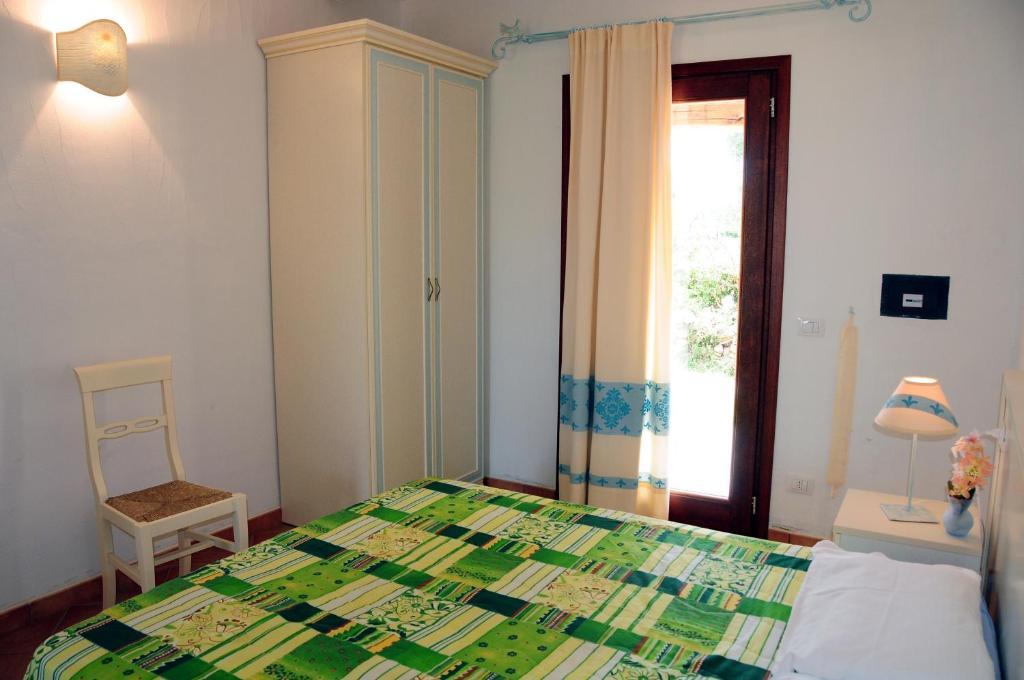 Le Tre Querce Aparthotel San Teodoro  Phòng bức ảnh