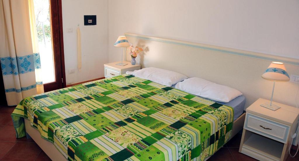 Le Tre Querce Aparthotel San Teodoro  Phòng bức ảnh
