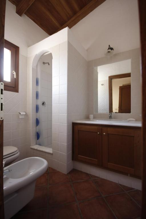 Le Tre Querce Aparthotel San Teodoro  Phòng bức ảnh